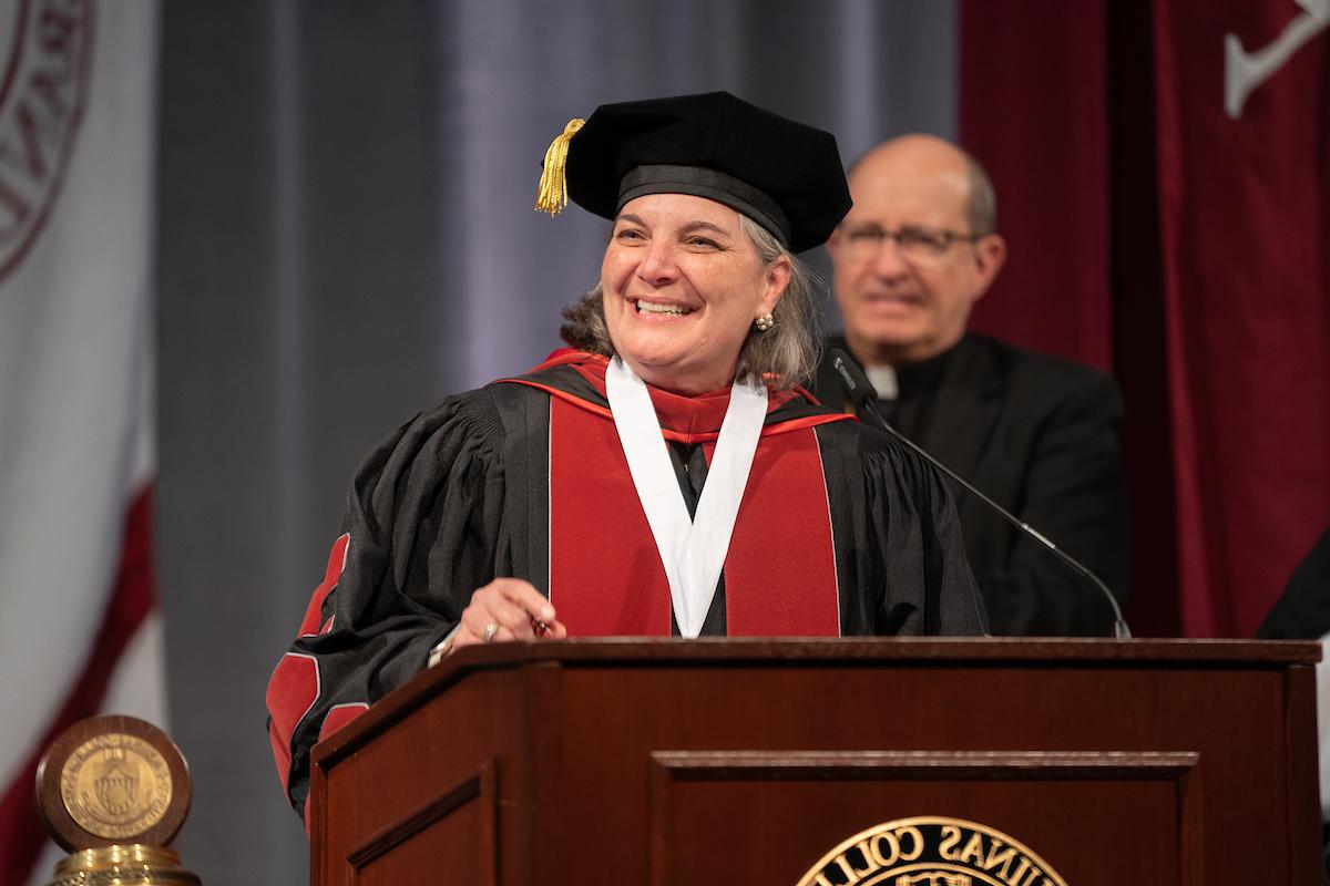 Alicia Cordoba in Regalia at the podium